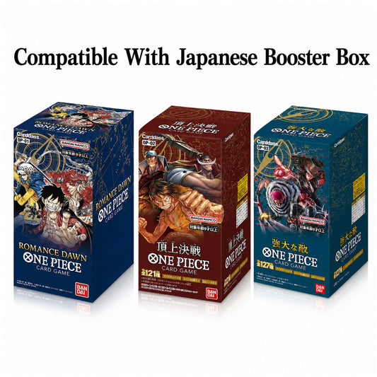 Three One Piece card game booster boxes shown side by side on a white background, with the text 'Compatible With Japanese Booster Box' above them. The boxes feature colorful anime artwork and branding for Romance Dawn and Grand War.
