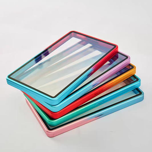Stack of colorful tablet cases on a light gray background