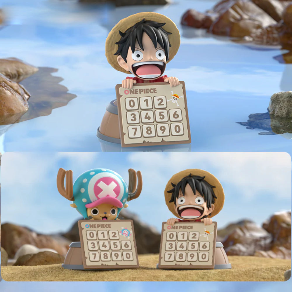 Two figurines of characters from 'One Piece' holding calculators with numbers on a beach background.