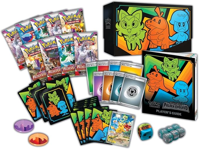 Pokémon trading card game set with cards, dice, and guidebook on a white background