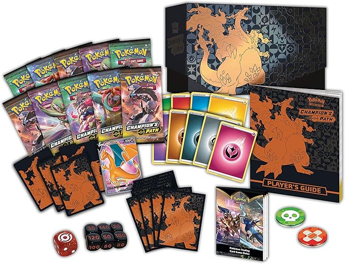 Pokémon trading card game set with cards, dice, and player's guide on a white background