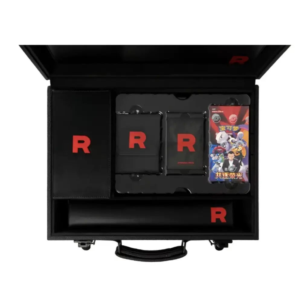 A black presentation case opened from above, containing several black rectangular accessories with large red 'R' logos and a smartphone case featuring colorful cartoon characters. The case also has a red 'R' logo on the inside lid.