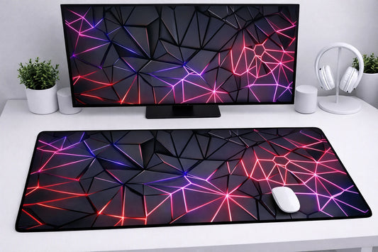 Large 24x12 inch cyberpunk mousepad featuring dark 3D geometric polygon shapes with glowing purple and pink neon lines on a clean desk setup.