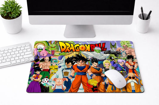 Large 24x12 inch Dragon Ball Z mousepad featuring a colorful collage of Goku, Vegeta, and various heroes and villains on a clean desk setup.