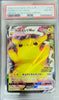 Pokémon trading card featuring Pikachu VMAX with a PSA label on top