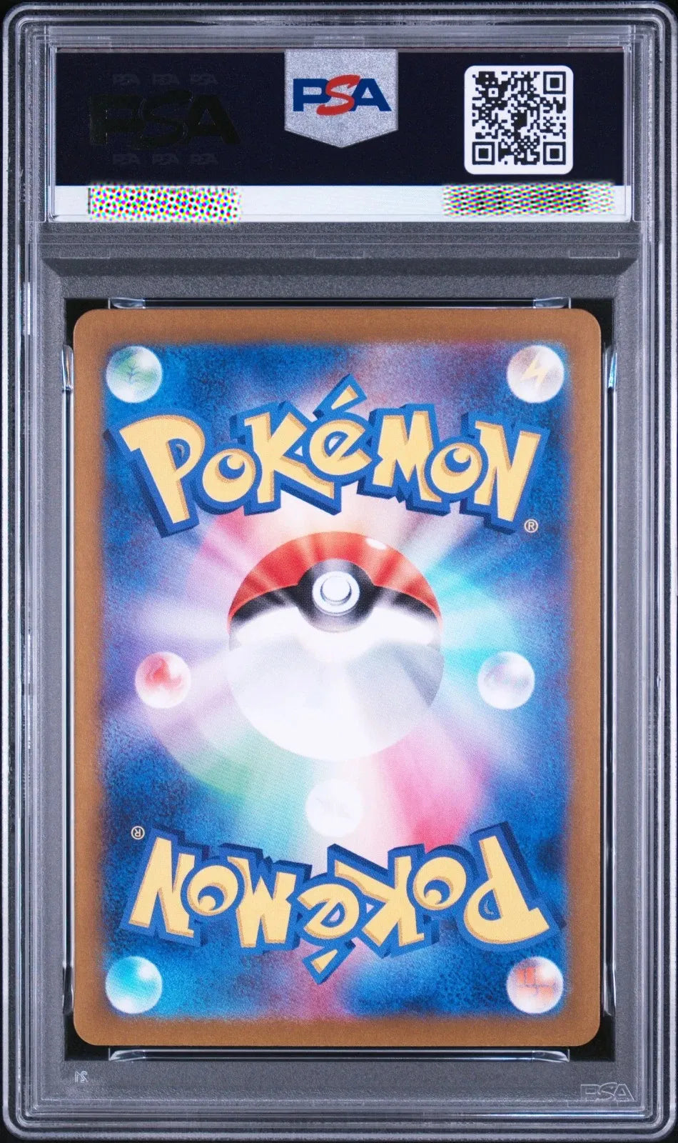 A graded Pokémon card in a PSA protective slab. The card features a colorful blue and pink background with a Pokéball in the center and the word 'Pokémon' in large yellow letters at the top and bottom.