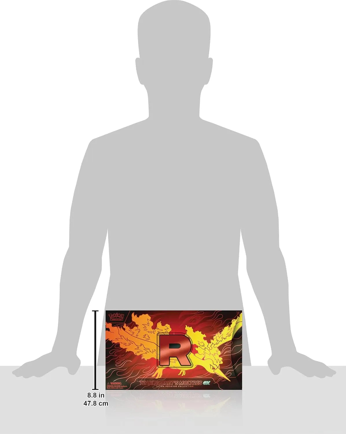 Cardboard box with a red and yellow design, size indicated by a person's silhouette.