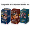 Three One Piece card game booster boxes shown side by side on a white background, with the text 'Compatible With Japanese Booster Box' above them. The boxes feature colorful anime artwork and branding for Romance Dawn and Grand War.