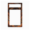 A rectangular decorative plate or frame with a marbled tortoiseshell pattern in brown, orange, and black, featuring a top cutout and a large central cutout, shown on a plain white background.
