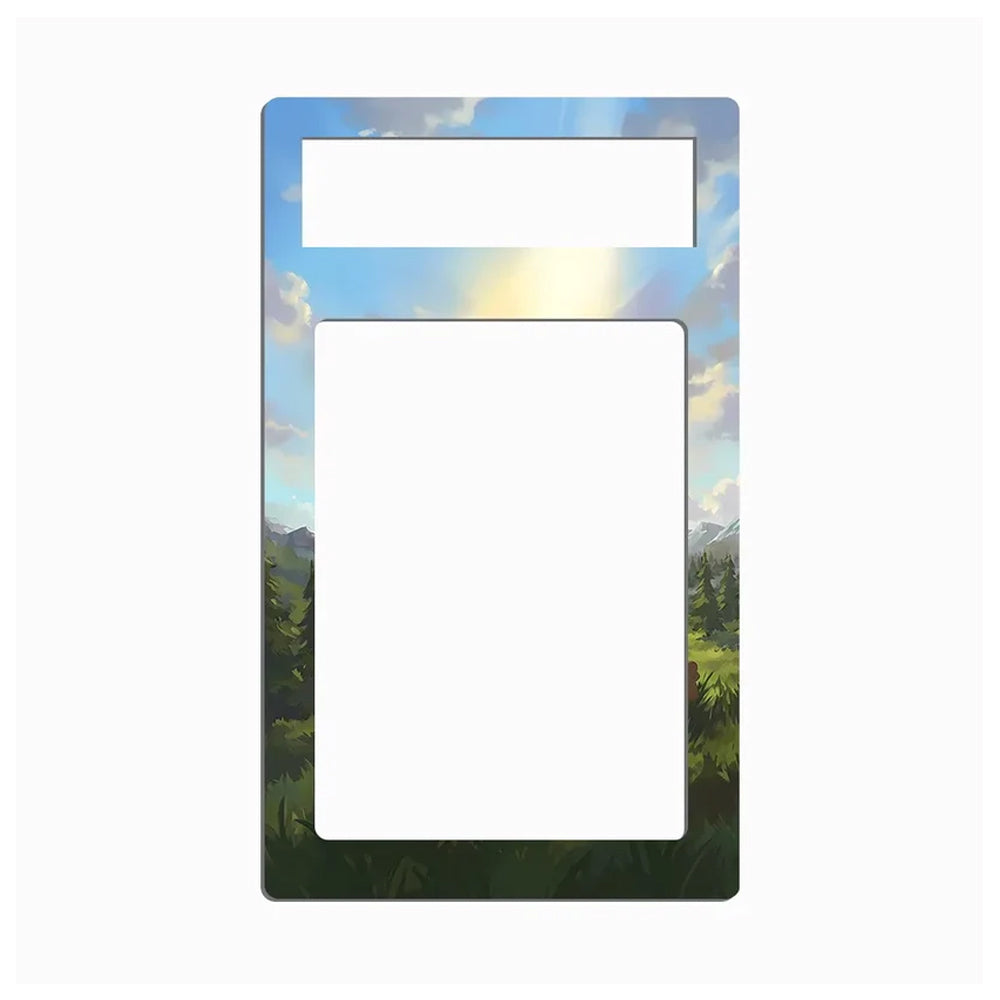 A vertical rectangular light switch plate cover featuring a scenic landscape print with a blue sky, sun rays, clouds, and green trees, shown on a plain white background.