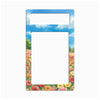 A rectangular picture frame with a colorful border depicting a blue sky with clouds and a field of pink, red, orange, and yellow flowers, shown on a plain white background.