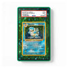 A green PSA slab-protected trading card encased in a clear protective holder, with a PSA grading label visible at the top. The card artwork shows a blue and yellow Blastoise illustration on a sparkling green background.
