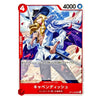 A character trading card featuring an illustrated blonde man in a black hat and white coat holding swords, with red and blue game UI elements and Japanese text on a white card background.