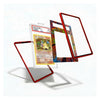 A set of clear acrylic card protectors with red borders and one colorful patterned protector, shown floating around a graded Charizard Pokémon card on a white background.