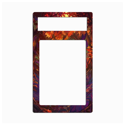 A decorative rectangular frame or plate with a large blank white center and a smaller white rectangular slot at the top, surrounded by an autumn leaf pattern in orange, red, purple, and brown tones on a light gray background.
