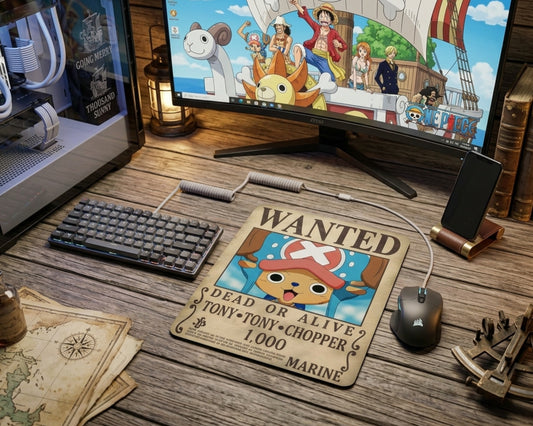 Tony Tony Chopper wanted poster anime mouse pad on rustic wooden gaming desk with mechanical keyboard, pirate map accessories, One Piece wallpaper monitor, and nautical workspace decor