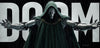 A stylized poster-like artwork of a hooded armored figure with metallic arms and a dark green cloak, posed in front of large white letters spelling DOOM against a dark rainy background.