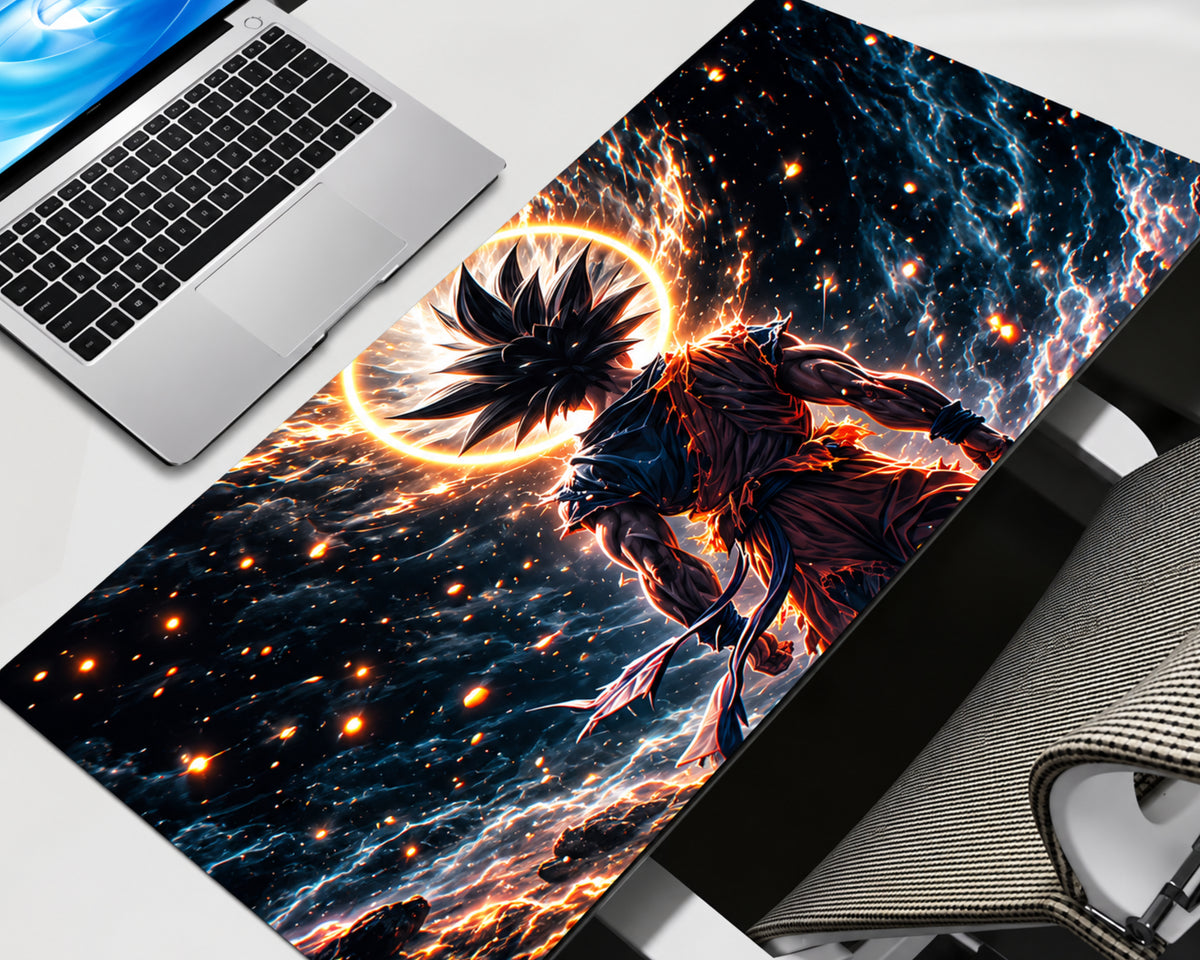 Dragon Ball Z Goku extended gaming mouse pad featuring a black-haired anime warrior surrounded by a glowing orange halo, electric blue lightning, fiery sparks, and a dark cosmic background.