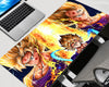 Dragon Ball Z Majin Vegeta extended gaming mouse pad featuring multiple golden-haired Vegeta illustrations, a purple battle outfit, glowing golden energy bursts, and electric blue cosmic effects.