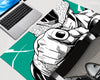 Dragon Ball Z Perfect Cell extended gaming mouse pad featuring a bold black-and-white manga illustration of Cell with a clenched fist against a vibrant teal-green background.