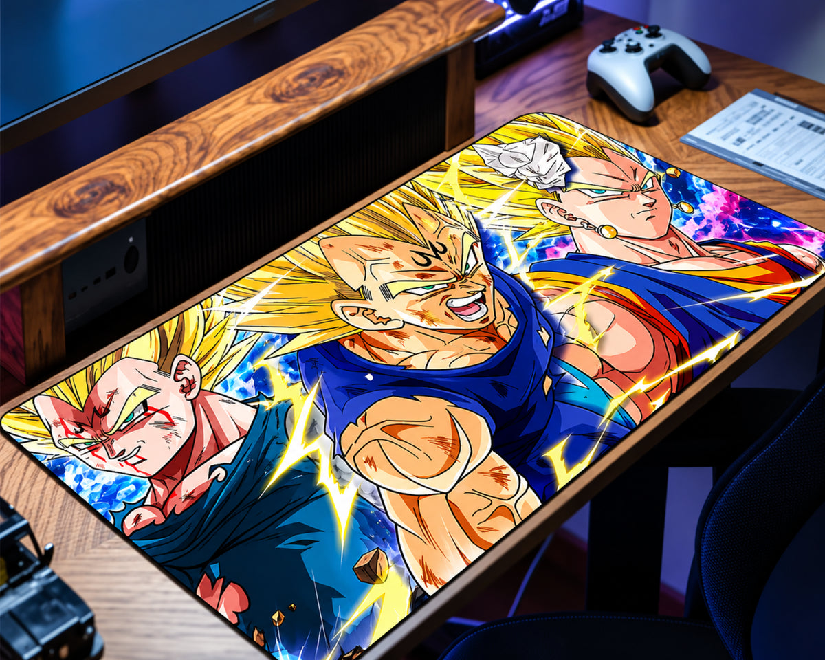 Dragon Ball Z Vegeta extended gaming mouse pad featuring multiple Super Saiyan character illustrations with golden spiky hair, blue outfits, and bright yellow lightning effects, displayed on a wooden gaming desk.