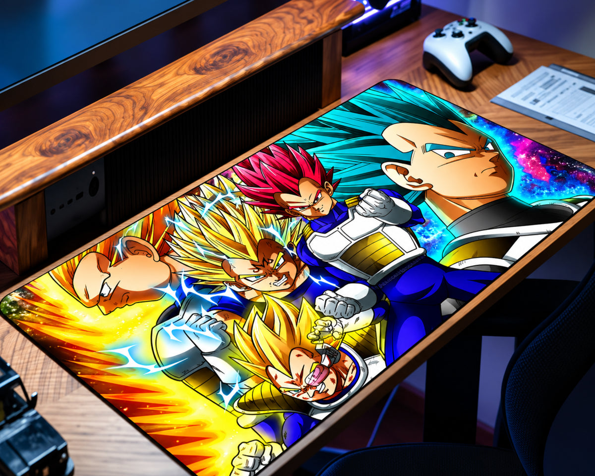 Dragon Ball Z Vegeta extended gaming mouse pad featuring multiple Saiyan warrior illustrations in blue and white armor, golden and red spiky hair, and vibrant yellow, turquoise, and blue energy effects, displayed on a wooden gaming desk.