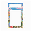 A decorative rectangular picture frame with rounded corners, featuring a colorful illustrated border of pastel clouds, balloons, buildings, and plants, with a large blank white center and a smaller horizontal white slot near the top.