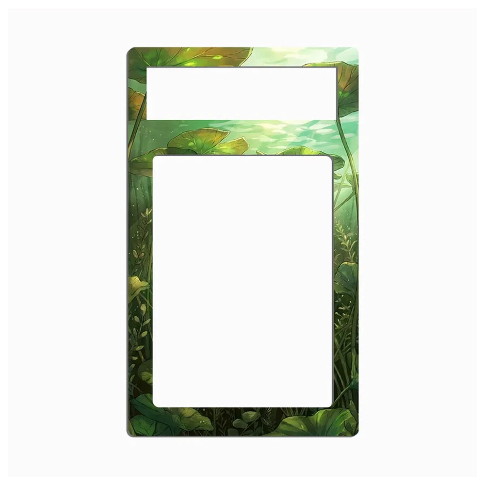 A rectangular decorative frame or cover with rounded corners, featuring an illustrated green lotus pond design around the border. The center is open, with a smaller horizontal slot at the top and a large vertical opening in the middle, shown on a plain white background.