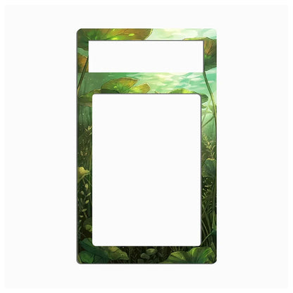 A rectangular decorative frame or cover with rounded corners, featuring an illustrated green lotus pond design around the border. The center is open, with a smaller horizontal slot at the top and a large vertical opening in the middle, shown on a plain white background.