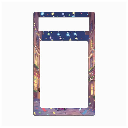 A decorative rectangular frame or mat with a large blank white center and a colorful illustrated border showing a street scene with warm lights, blue sky, and confetti.