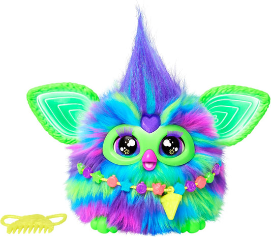 Furby Galaxy Edition interactive plush toy glowing in the dark with 15 colorful fashion accessories for kids ages 6 and up.