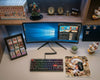 Modern One Piece anime gaming setup featuring Gear 5 Luffy themed mouse pad, RGB mechanical keyboard, ultrawide monitor, manga collectibles, and clean desktop workspace aesthetic