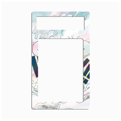 A decorative rectangular card or label template with rounded corners, featuring a pastel watercolor cloud pattern in pink, blue, and white, with two blank white cutout areas near the top and sides.
