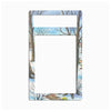 A rectangular metal plate with a single cutout, featuring a winter landscape illustration of bare trees in snow under a light blue sky.