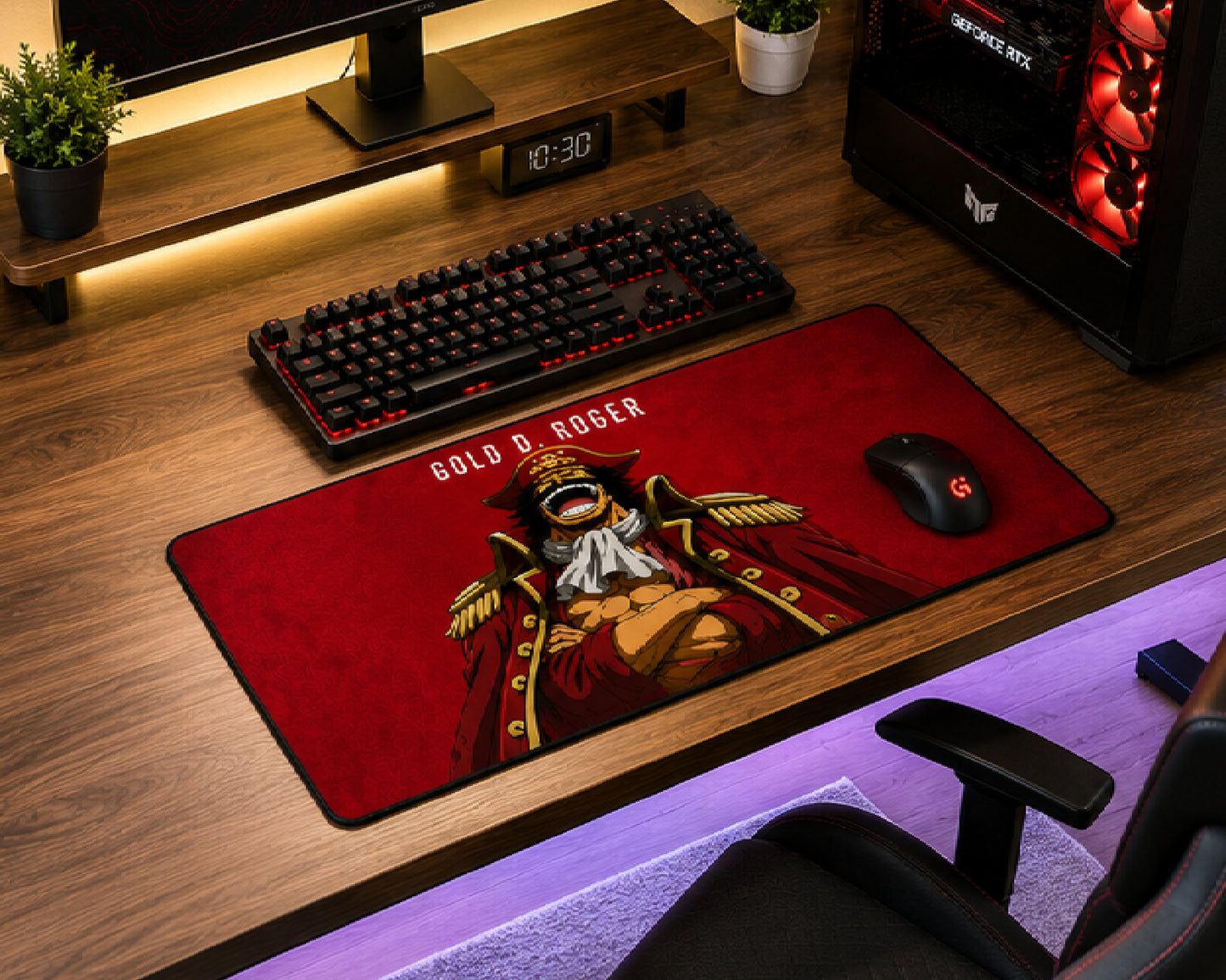A large red desk mat featuring a detailed illustration of Gold Roger from One Piece, styled on a wooden desk alongside a keyboard, mouse, and computer tower.
