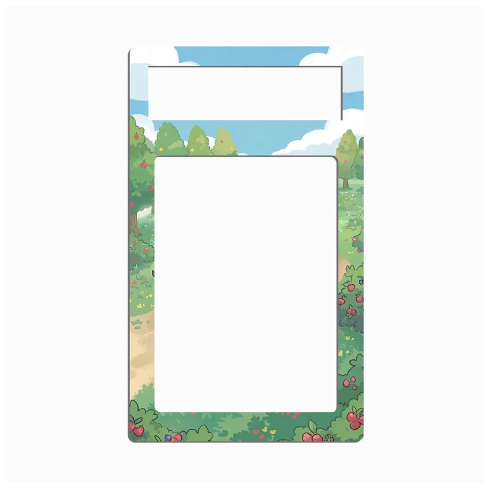 A rectangular magnetic clipboard with rounded corners, featuring a colorful cartoon landscape border with green trees, red berries, and a blue sky, and a blank white writing area in the center.