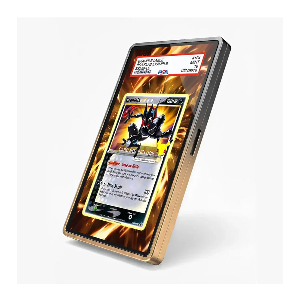 A custom protective phone case with a metallic gold frame and a black backplate featuring a fiery orange and yellow flame pattern. The screen is active, displaying a Pokémon trading card, and the case is shown standing upright on a clean white background.