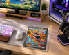 A colorful Pokémon trading card featuring a character on a gray desk mat, styled on a wooden desk alongside a keyboard, mouse, monitor, and PC tower.