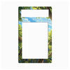 A rectangular picture frame with a scenic forest border featuring green trees, blue sky, and white clouds, with two blank white photo slots.