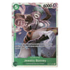 A single trading card featuring the character Jewelry Bonney from the anime franchise. The card has a green border with the character's name and stats printed on it, and the artwork shows Bonney in a dynamic pose with pink hair and a green hat against a dark purple background.