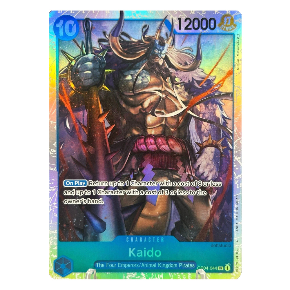 A holographic trading card featuring the character Kaido from The Four Emperors: Animal Kingdom, with a detailed illustration of a horned warrior and game text including 12000.