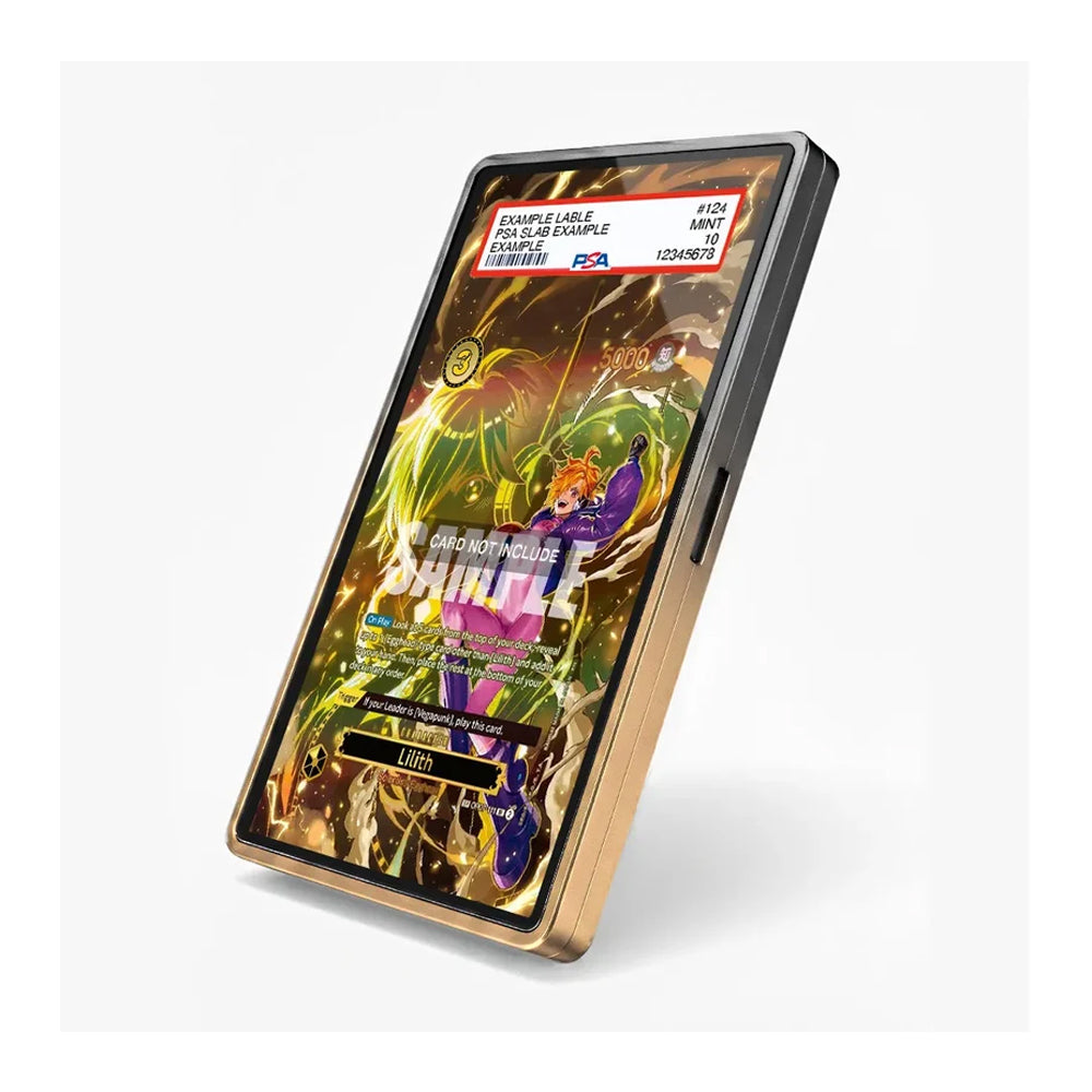 A slim rectangular electronic device with a black front and metallic gold side frame, shown at an angle on a light gray background. The screen displays colorful fantasy artwork with text including 'SHINLE' and 'EXTRAVAGANT EXHIBITION'.