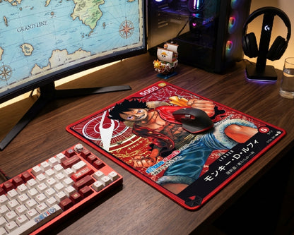 Monkey D. Luffy inspired anime gaming mouse pad with Grand Line map display, RGB gaming PC, custom keyboard, and pirate themed desk setup
