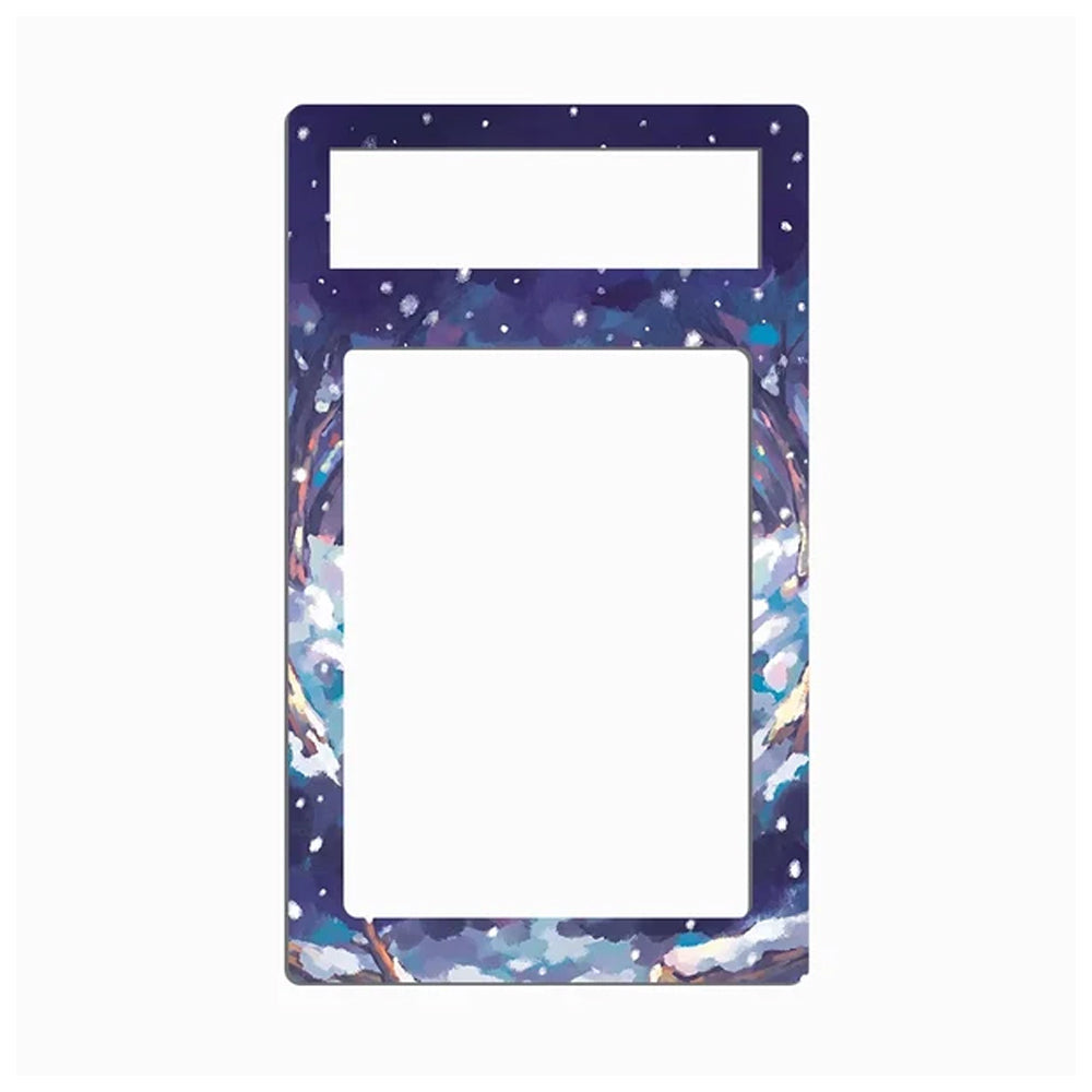 A rectangular decorative frame or border with a snow-covered mountain landscape print in blue, white, and purple tones, shown on a plain light gray background.