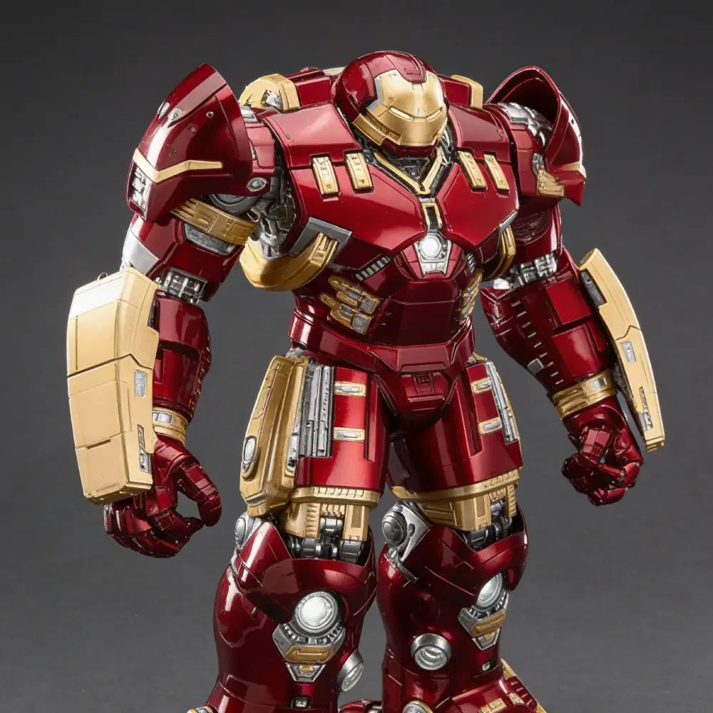 Red and gold superhero robot figure on a dark background