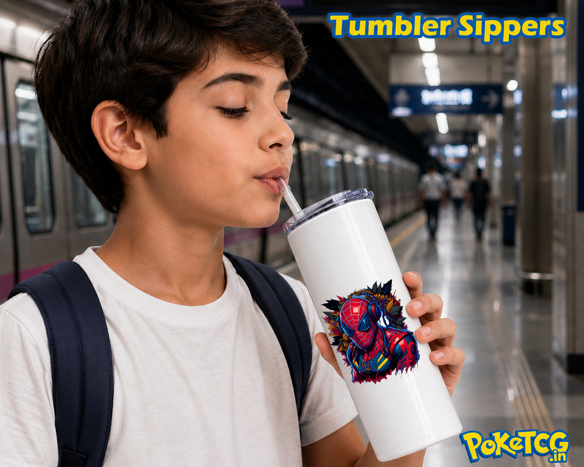 A boy at a train station drinking from a white tumbler sipper with a Spider-Man graphic, with 'Tumbler Sippers' and 'PokéTCG' text overlays.