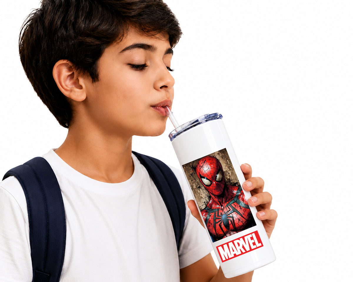 A young boy with a white t-shirt and dark backpack straps is shown drinking from a white tumbler with a Spider-Man graphic and a red Marvel logo, set against a solid white background.
