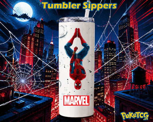 A white insulated tumbler with a clear lid and straw, featuring a Spider-Man graphic and the Marvel logo, set against a stylized red and blue city skyline at night with web silhouettes. Text at the top reads 'Tumbler Sippers' and a PoketCG logo appears in the bottom right corner.