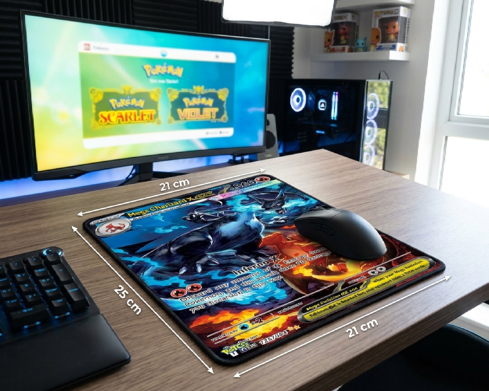 Mega Charizard X inspired Pokémon gaming mouse pad with blue fire and orange flame artwork displayed on a modern gaming desk with RGB PC setup and wireless mouse