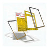 A clear acrylic display card holder with gold and black borders, shown holding a graded gold-colored Pokémon TCG card. The product is displayed in three floating angles on a clean white background with soft shadows.